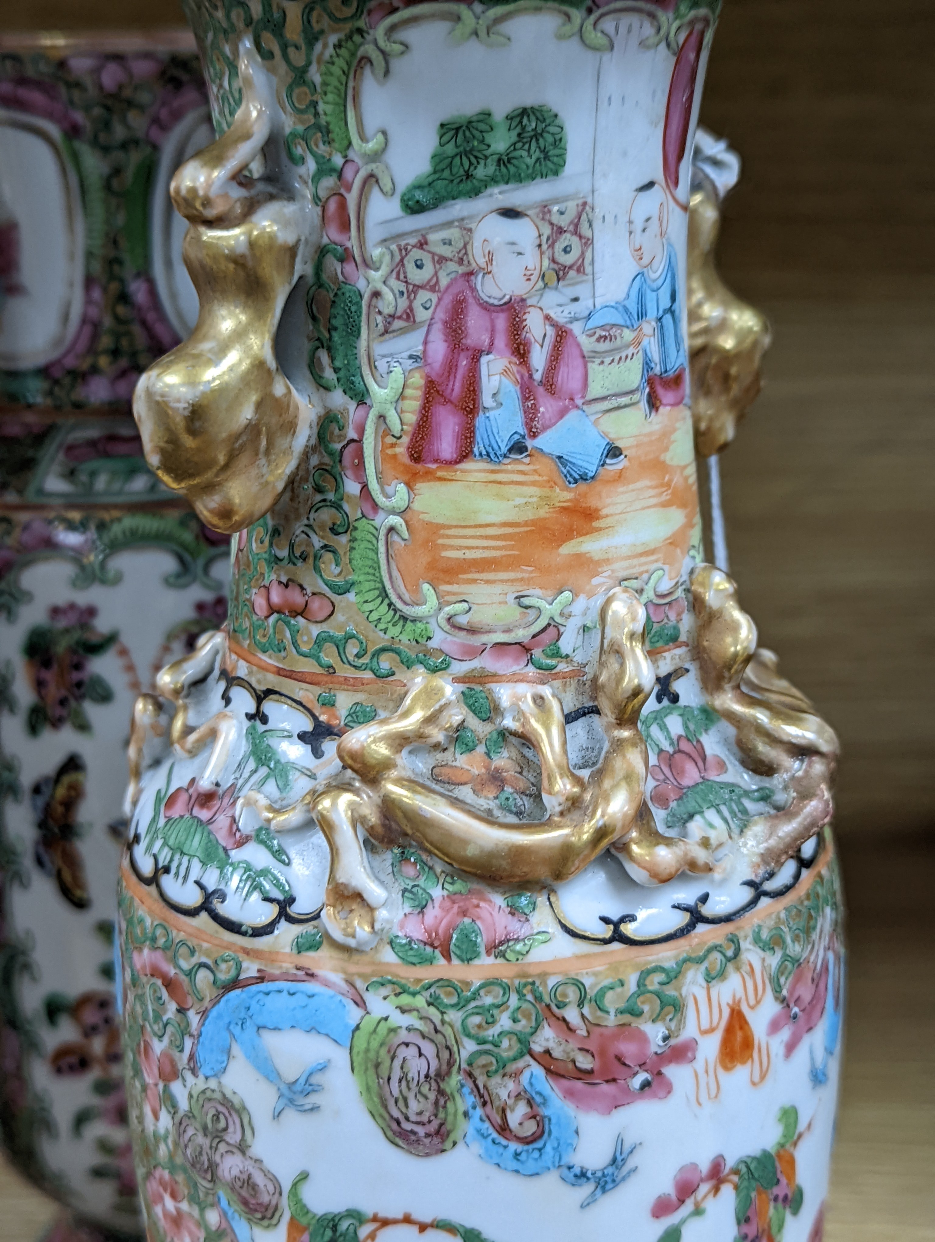 Two Chinese famille rose vases, late 19th century, tallest 26 cm, one wood stand, some restoration